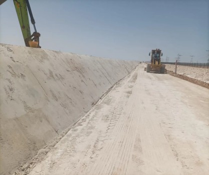 SAZEC GROUP motor grader and excavator on canal earthworks