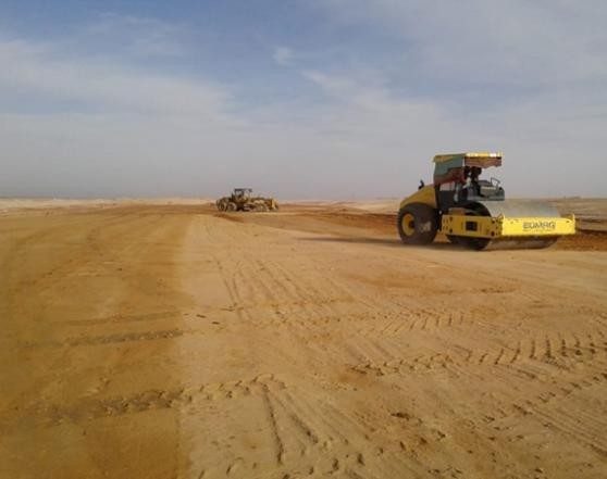 SAZEC GROUP BOMAG road roller compacting graded soil