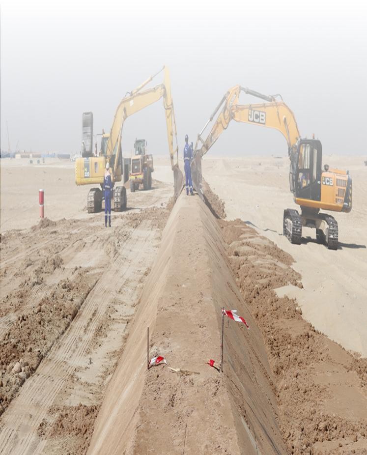 SAZEC GROUP JCB excavators shaping earth berm on project site